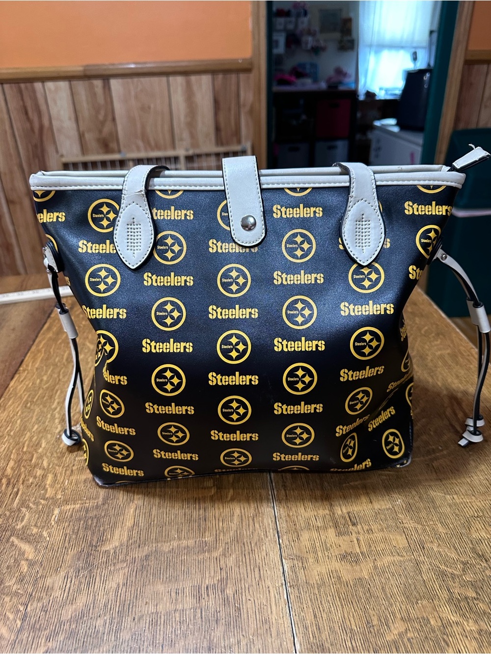 Little Earth Pittsburgh Steelers Black and Gold Shoulder Tote zips closed